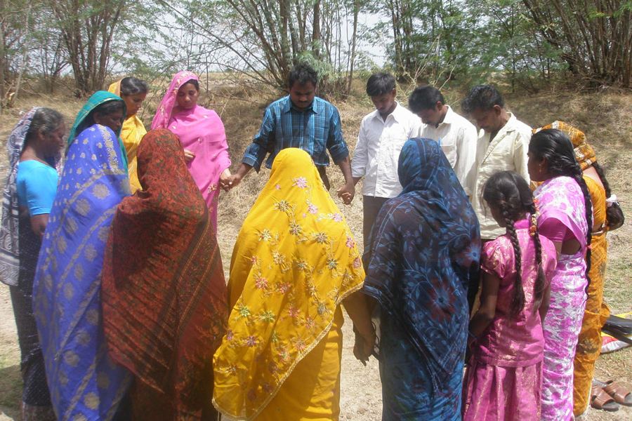 A village gathering before a baptism